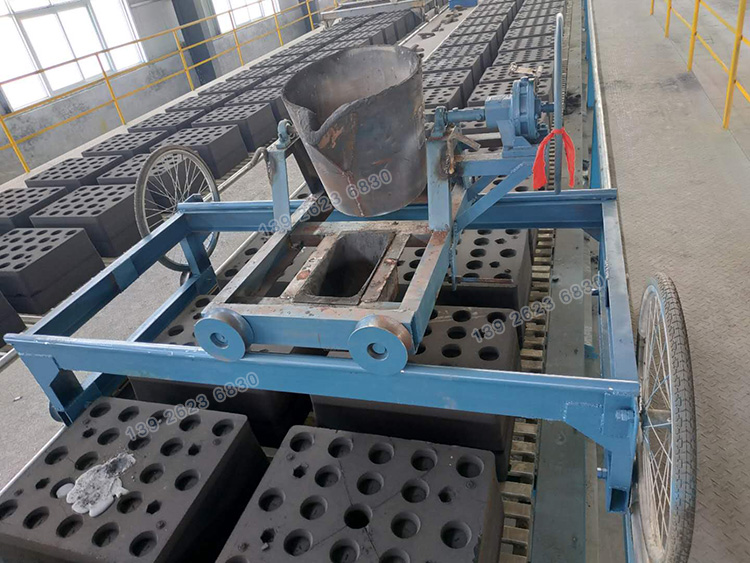 全自動(dòng)造型機(jī)鏈板輸送線.jpg 全自動(dòng)造型機(jī)鏈板輸送線.jpg